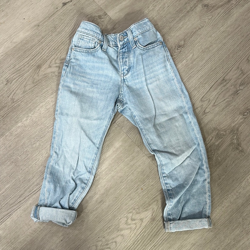 Straight leg, adjustable waist.